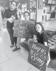  ??  ?? Volunteers at the Trunk Sale booth at CityOne Megamall.