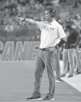  ?? Fla. JASEN VINLOVE/USA TODAY SPORTS ?? Former Miami football coach Manny Diaz gestures during a game against Virginia Tech on Nov. 20 in Miami Gardens,