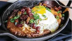  ?? Jeff Amador ?? Jalapeno-cheese Southern hoecake with guanciale and sorghum butter at Cane Rosso in Montrose