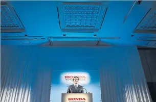  ?? TOMOHIRO OHSUMI GETTY IMAGES ?? Honda president Takahiro Hachigo announces the closure of an English plant Tuesday in Tokyo.