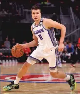  ??  ?? Bogdan Bogdanovic (8) of the Sacramento Kings plays against the Detroit Pistons at Little Caesars Arena on Jan. 22 in Detroit, Mich. Bogdanovic finished this game with 19 points, three assists and two rebounds.