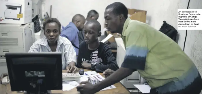  ?? Per-Anders Pettersson ?? An internet cafe in Kinshasa, Democratic Republic of Congo. Young Africans have been active in the clampdown on fraud