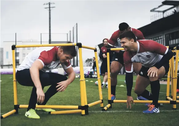  ?? AFP ?? Scrum-half Ben Youngs, right, and his England teammate Owen Farrell take part in a training session yesterday ahead of the New Zealand semi-final