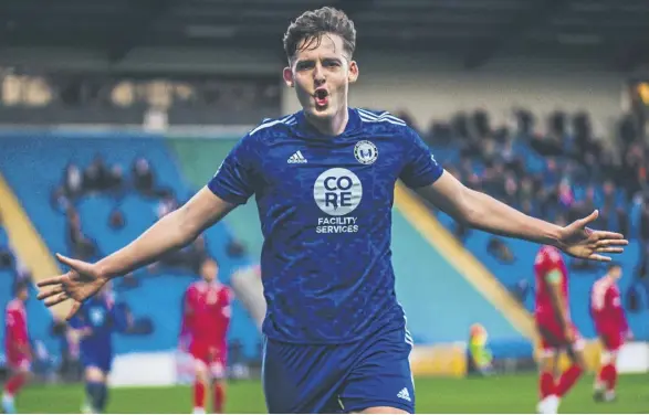  ?? ?? Rob Harker celebrates his goal against Bromley on Tuesday evening. Pic: Marcus Branston