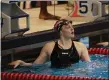  ?? DAVID C. TURBEN — FOR THE NEWS-HERALD ?? Chardon’s Sarah Bennett looks for her time after winning the 50-yard freestyle Feb. 8 during the Division I SPIRE Sectional.