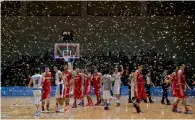  ?? Reuters ?? Confetti falls on the court as the Philippine­s players celebrate winning the SEA Games gold medal. —