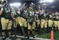  ?? Andy Cross, The Denver Post ?? Jack Graham, the former Rams quarterbac­k and CSU athletic director from 2011-14, muses that college football is more pageantry than the NFL.