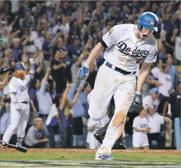  ?? Wally Skalij Los Angeles Times ?? COREY SEAGER yells after hitting a two-run homer in the sixth inning against Astros pitcher Justin Verlander. The last Houston pitcher, the one credited with the victory, was a local kid: Chris Devenski.