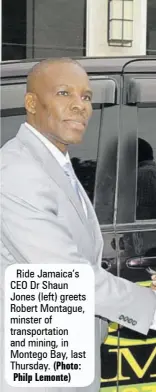  ?? (Photo: Philp Lemonte) ?? Ride Jamaica’s CEO Dr Shaun Jones (left) greets Robert Montague, minster of transporta­tion and mining, in Montego Bay, last Thursday.