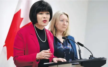  ?? CP ?? Federal Health Minister Ginette Petitpas Taylor speaks at Monday’s news conference as Ottawa-Vanier Liberal MP Mona Fortier looks on.