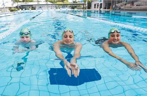  ?? Picture: STEWART McLEAN ?? FAST LANE: Stingrays Swimming Club members Thomas Greatorex, 10, Benjamin Waters, 15, and Keely Salecich, 14.