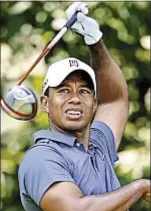  ?? Photo by EPA ?? Tiger Woods has trouble finding fairways Thursday during first round of AT&amp;T National at Congressio­nal Country Club.
