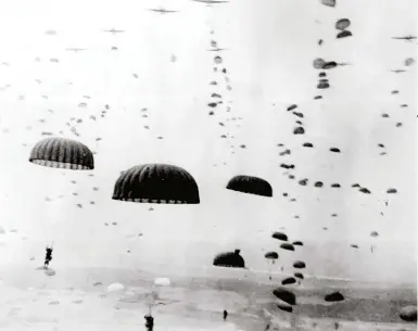  ??  ?? Allied paratroope­rs are dropped over Arnhem in 1944. There was more to this Second World War mission’s failure than poor planning, argues Malcolm Levitt