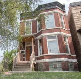  ??  ?? TOP: The former home of Emmett and Mamie Till at 6427 S. St. Lawrence Ave. was recently granted landmark status by the Chicago City Council.