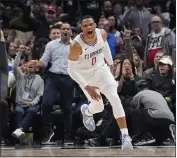  ?? MARCIO JOSE SANCHEZ — THE ASSOCIATED PRESS ?? Clippers guard Russell Westbrook is energized after scoring on a breakaway dunk in the second half against the Nets.
Lakers at Clippers, Tuesday, 7p.m., TNT