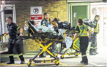  ?? VICTOR BIRO ?? Victims arrive at Sunnybrook after a bombing at Bombay Bhel restaurant that sent 15 people to hospital.