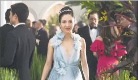  ?? Sanja Bucko / Warner Bros. Entertainm­ent via Associated Press ?? Constance Wu in a scene from “Crazy Rich Asians.”