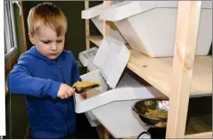  ?? ?? Rory McGregor, 4, scooping out some pasta