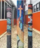  ?? ?? The totem poles at St Andrew’s College. Picture: Supplied