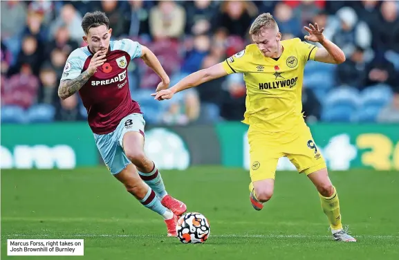  ?? ?? Marcus Forss, right takes on Josh Brownhill of Burnley