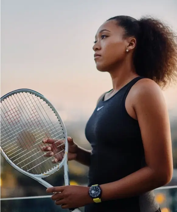  ??  ?? Naomi Osaka wears the Connected watch by Tag Heuer