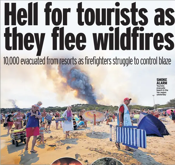  ??  ?? SMOKE ALARM Tourists evacuate beach in the Var region yesterday