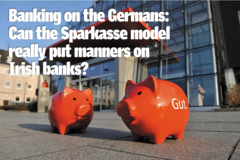  ??  ?? Sparkasse piggy banks outside one of the branches in Germany. The methods of the bank Sparkasse are winning over fans here, too — especially in the wake of the stories about people being left devastated by Irish banks over tracker mortgages