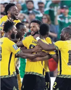  ?? FILE ?? Jamaica’s Reggae Boyz celebrate after scoring in their Gold Cup semi final match against Mexico on July 23. Jamaica won the match 1-0. The team will next be in action against South Korea on January 30, in Turkey.