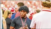  ?? JEFF SENTELL/DAWGNATION ?? Blessed Trinity running back Justice Haynes attends the Georgia-south Carolina game Saturday in Athens after rushing for 356 yards and 3 TDS in a 24-21 victory over Eagle’s Landing Christian on Friday.