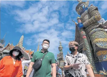  ?? REUTERS ?? Tourists visit the Grand Palace in Bangkok on Jan 7.