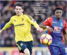  ?? — Reuters ?? Crystal Palace’s Wilfried Zaha in action with Middlesbro­ugh’s Marten de Roon.