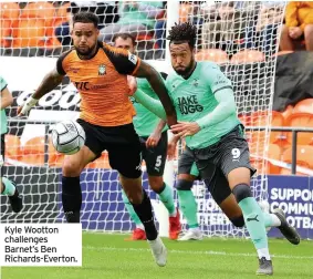  ??  ?? Kyle Wootton challenges Barnet’s Ben Richards-everton.