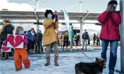  ??  ?? A child holds a placard during a demonstrat­ion asking for the reopening of a ski resort in the French Alps for the Christmas holidays on Wednesday. Photograph: Olivier Chassignol­e/AFP/Getty Images