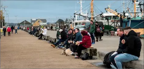  ??  ?? People enjoying the quayfront on Sunday afternoon.