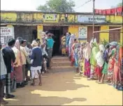  ?? HT FILE ?? Voters queue outside a polling station during the first phase of voting in Chhatisgar­h on Monday.