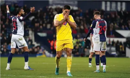  ?? ?? Aleksandar Mitrovic reacts after missing a chance during Fulham’s defeat at West Brom. Photograph: Nick Potts/PA