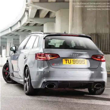  ??  ?? TELL-TALE SIGNS AT THE REAR INCLUDE THE RS BADGE, AN UNDER- BUMPER DIFFUSER AND TWIN OVAL TAILPIPES