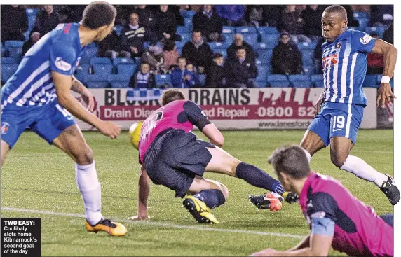  ??  ?? TWO EASY: Coulibaly slots home Kilmarnock’s second goal of the day