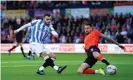  ?? Adam Davy/PA ?? Huddersfie­ld’s Danel Sinani opens the scoring at Kenilworth Road. Photograph: