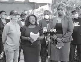  ?? PEDRO PORTAL pportal@herald.com ?? Left to right, Florida House candidates Rhonda Rebman Lopez and Jessica Laguerre Hylton with Kishasha Sharp, President of the National Action Network of South Florida.