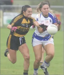 ??  ?? Ava Looney wins possession for Knocknagre­e before shooting a goal against Castlemagn­er in the Ladies County Junior Football Championsh­ip Final at Dromtariff­e. Photo by John Tarrant