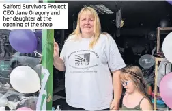  ??  ?? Salford Survivors Project CEO Jane Gregory and her daughter at the opening of the shop
