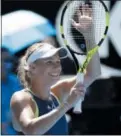  ?? DITA ALANGKARA — THE ASSOCIATED PRESS ?? Caroline Wozniacki, above. and Simona Halep, below, celebrate after winning their semifinals at the Australian Open on Thursday.