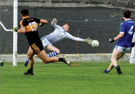  ?? Photo by Michelle Cooper Galvin ?? Tony Brosnan Dr Crokes scoring a goal against Mark LooneyTemp­lenoe in the Kerry County Club Championsh­ip at Fitzgerald Stadium Killarney on Friday