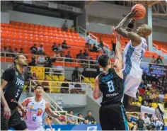  ?? ?? HOLLIS-JEFFERSON and brother Rahlir realized a lifelong dream as they teamed up to power TNT to a breakthrou­gh 80-69 win over Taipei in the East Asia Super League.