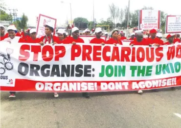  ?? Photo: Kayode Ekundayo ?? Workers during the rally to mark global industriAL­L World Decent Day in Lagos.