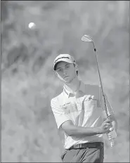  ?? AP/ALASTAIR GRANT ?? Austin Connelly, 20, who earned his way into the British Open through a 36-hole qualifier, is tied for third with a 5-under-par 205 after shooting a 66 in Saturday’s third round.