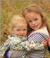  ??  ?? Amy Duane and Leah Fleming enjoying last year’s Newmarket Summer Festival’s Teddy Bear Picnic. Photo: Eileen O’Connor