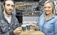  ??  ?? FEELING BLUE-GREEN: The End cafe’s Bret Caretsky and Madeline Murphy say their latte (with algae) was first.