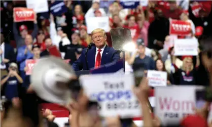  ??  ?? Donald Trump speaks to supporters during a rally in Charlotte, North Carolina. Photograph: Brian Blanco/Getty Images